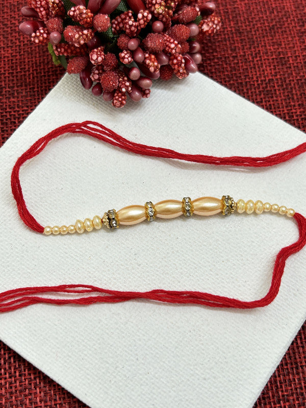 Red Thread White Cream Beads Rakhi For Brother