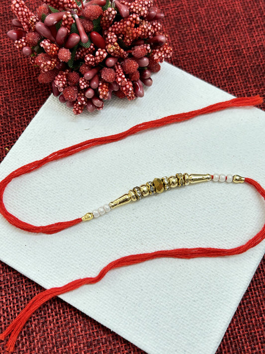 White Golden Pearl Rakhi For Brother