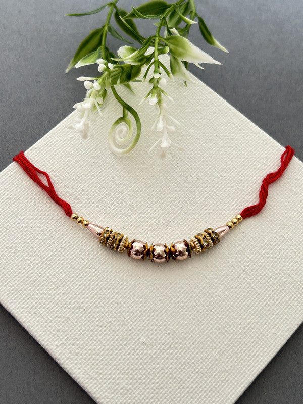 Golden Beads Pearl Rakhi For Brother